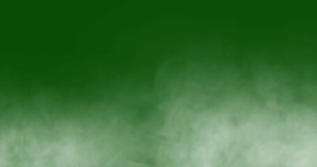 Wall Mural - smoke slowly floating through space against chroma key green screen