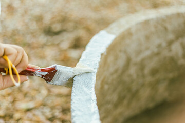 Close up  brush with white paint