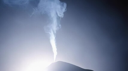 Wall Mural - fumarole rising slowly from volcanic crater with gradual sky transition from deep night toward soft 