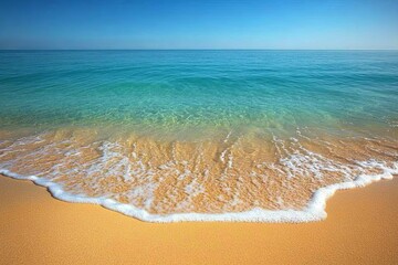 Wall Mural - Calm turquoise ocean waves gently lapping against a sandy beach on a sunny day