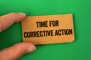 Leinwandbilder - Time for corrective action message written on cardboard paper on green background. Conceptual time for corrective action symbol. Copy space.
