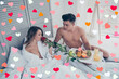 © deagreez - Good morning Handsome man with naked torso make romantic surprise in bed bring breakfast and red rose for his beautiful sexy lover, she enjoying aroma of flower, dream love story on 8 march