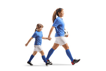 Sticker - Full length shot of a female football player walking and holding hand with a girl