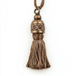© Aleksandra - Vintage bronze curtain tassel with intricate floral design for classic interior decoration