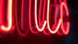 © hwsky - Close-up of a glowing neon sign in the dark
