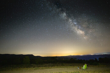 landscape with blue milky way. night sky with stars at mountains, universe, beautiful mountain valle