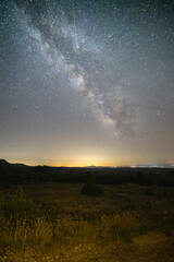 Landscape with blue Milky Way. Night sky with stars at mountains, Universe, beautiful mountain valley Mora de Rubielos Teruel Aragon Spain