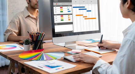 Fototapete - Project planning software for brisk business project management on the computer screen showing timeline chart of the team project