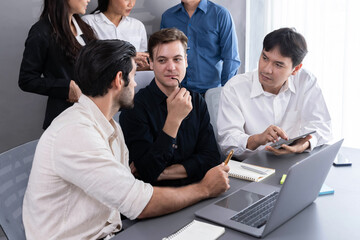 Wall Mural - Group of diverse office worker employee working together on strategic business marketing planning in corporate office room. Positive teamwork in business workplace concept. Prudent