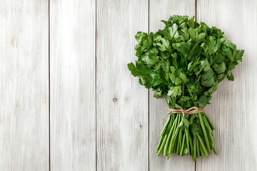 Wall Mural - Fresh Parsley Bunch on White Wooden Background