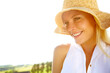 © peopleimages.com - Nature, smile and portrait of woman with sunhat in countryside for vacation or adventure. Travel, mockup space and female person from Australia outdoor with accessory on holiday or weekend trip.