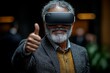 © serdon - A businessman with VR goggles makes an OK gesture with his hand