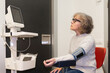 © ADDICTIVE STOCK - Mature woman having a blood pressure test in a clinic