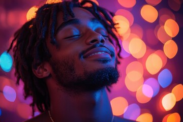 Captivating moment of a young man enjoying music under colorful bokeh lights at a vibrant night event