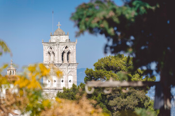 Wall Mural - Church tower standing tall in Pano Lefkara, Cyprus, on sunny day. Larnaca District