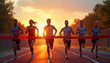 © Viktor - Group of athletic adults cross finish line together at sunset. Teamwork leads to shared success. Active lifestyle, achievement highlighted. Motivated people run on track. Successful competitive