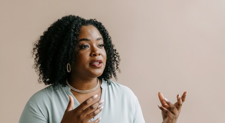 Wall Mural - A woman with curly hair is talking to someone