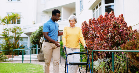 Wall Mural - Nurse, outdoor and support with old woman and walker for rehabilitation, healthcare or helping. Medical, advice and caregiver with person with a disability in nursing home for elderly care and trust