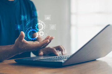 Fototapete - Robotic process automation concept. RPA, artificial intelligence. Man hand uses laptop with virtual automation technology to automate business tasks with AI. Digital transformation, change management.