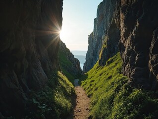 Wall Mural - Sunlight piercing through a narrow passage between two rocky cliffs with a walking path