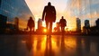 © Vertigo Images - Silhouetted businesspeople walk towards a vibrant sunset in a modern city. The warm colors create a powerful image of ambition and success.
