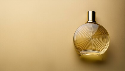 Wall Mural - Elegant perfume bottle on gold background.  Luxury fragrance.