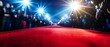 © hsantima - Red carpet event with bright lights and crowds.