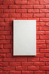 Wall Mural - Blank canvas frame on red brick wall