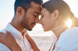 © peopleimages.com - Beach, couple and bonding with love on vacation, travel holiday and connection on valentines day. Soulmate, man or woman with admiration embrace for relationship, dating or romantic with hug by flare