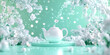 © JRedwan Stock - Teapot with splashing water and ice cubes on mint green background