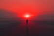 © Ahmed - A solitary figure walking through an abstract, misty landscape, drawn toward a soft red glow on the horizon, with the surroundings filled with deep shadows