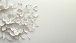 © KHF - A delicate paper cut decoration featuring blooming white flowers arranged in the left corner of a light background.