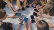 © Довидович Михаил - Young friends gather in a circle, using their smartphones to stay connected in the digital age