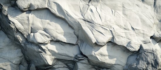 Leinwandbilder - Close-up View of Textured Rock Surface with Highlights and Shadows Suitable for Background Use Copy Space