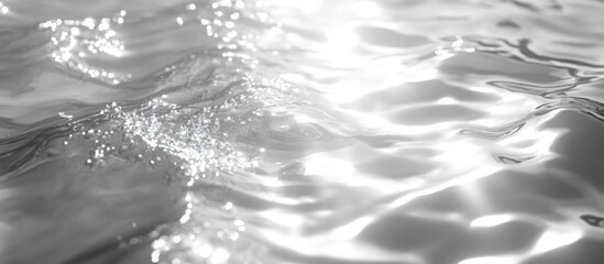 Leinwandbilder - Glistening water surface with wave patterns and reflections in monochrome with Copy Space