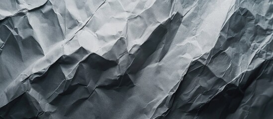 Fototapete - Dark textured abstract background with crumpled paper-like patterns and folds Copy Space