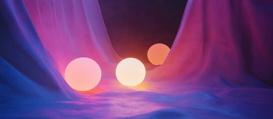 Leinwandbilder - Colorful glowing spheres on a soft fabric background with purple and blue gradients and ample copy space for text placement
