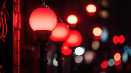 Poster - Illuminated red street lights during Christmas season in winter night with blurred background and copy space for festive text or design