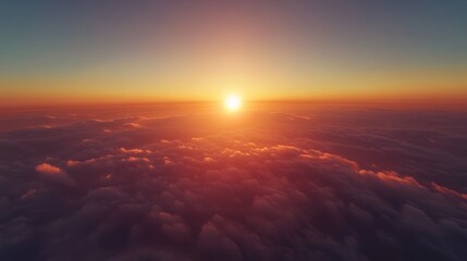 Aufkleber - Stunning aerial view of a sunrise above the clouds with vibrant colors and empty space for text or branding elements on the horizon
