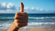 © Balerinastock - Thumbs Up for Beach Day! Ocean View and Positive Gesture