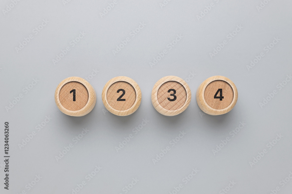 One, two, three, and four number on round wood blocks, step-by-step ...
