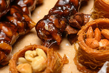 Wall Mural - Sweet food Turkish delight on wooden background, assorted locum and candy for decorated backdrop