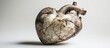 © STwul - Stone heart sculpture, studio shot, neutral background, medical/artistic use