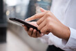 © peopleimages.com - Hands, balcony or businesswoman in city with phone or online connection for text message or social media chat. Lawyer, outdoor or legal advisor typing on mobile app for news, schedule or notification
