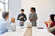 © Lumos sp - young business people meeting office businesswoman portrait happy smiling applause congratulating teamwork grouphappy smiling success applauding woman