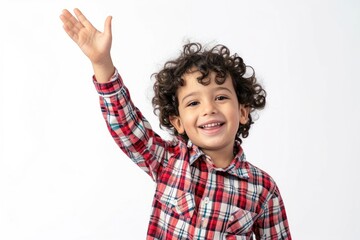 Canvas Print - Middle eastern boy 6 years old happy raising her hand smile white background studio shot.