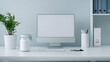 © Lailatul - Minimalist home office workspace with blank computer screen, plant, and supplies. Ideal for productivity, technology, and work-from-home themes