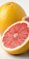 Wall Mural - Fresh Grapefruit Halves and Whole Fruit Presented Attractively. Generative AI