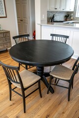 Sticker - Round Black Kitchen Table With Four Chairs in Home Setting. Generative AI