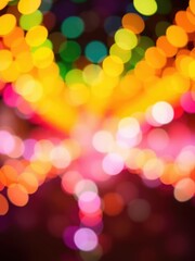 Wall Mural - Abstract and mesmerizing bokeh light background in a vibrant array of colors, vivid, festive, design